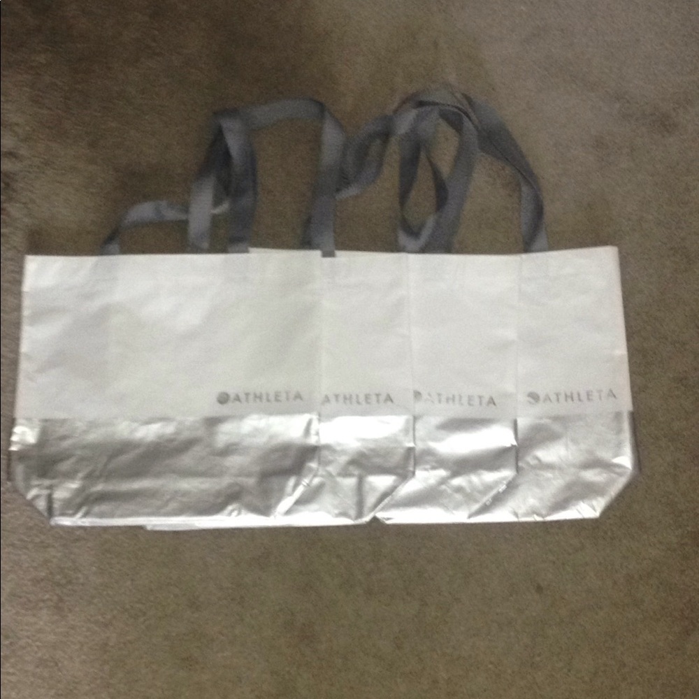 4 white silver Athleta bags!